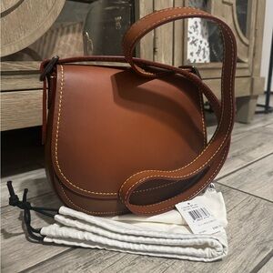 NWT Coach glovetanned leather saddle bag